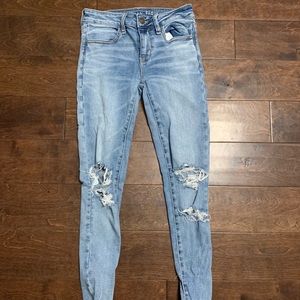 american eagle light wash jeans with rips